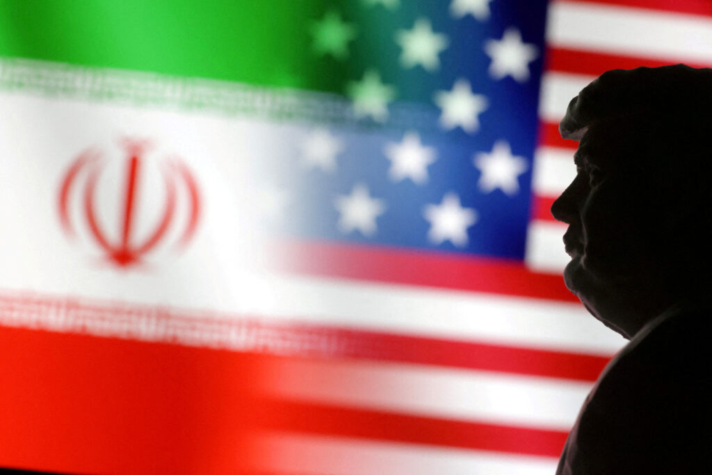 File Photo: Illustration Shows 3d Printed Miniature Model Of U.s. President Elect Donald Trump, And U.s. And Iran Flags